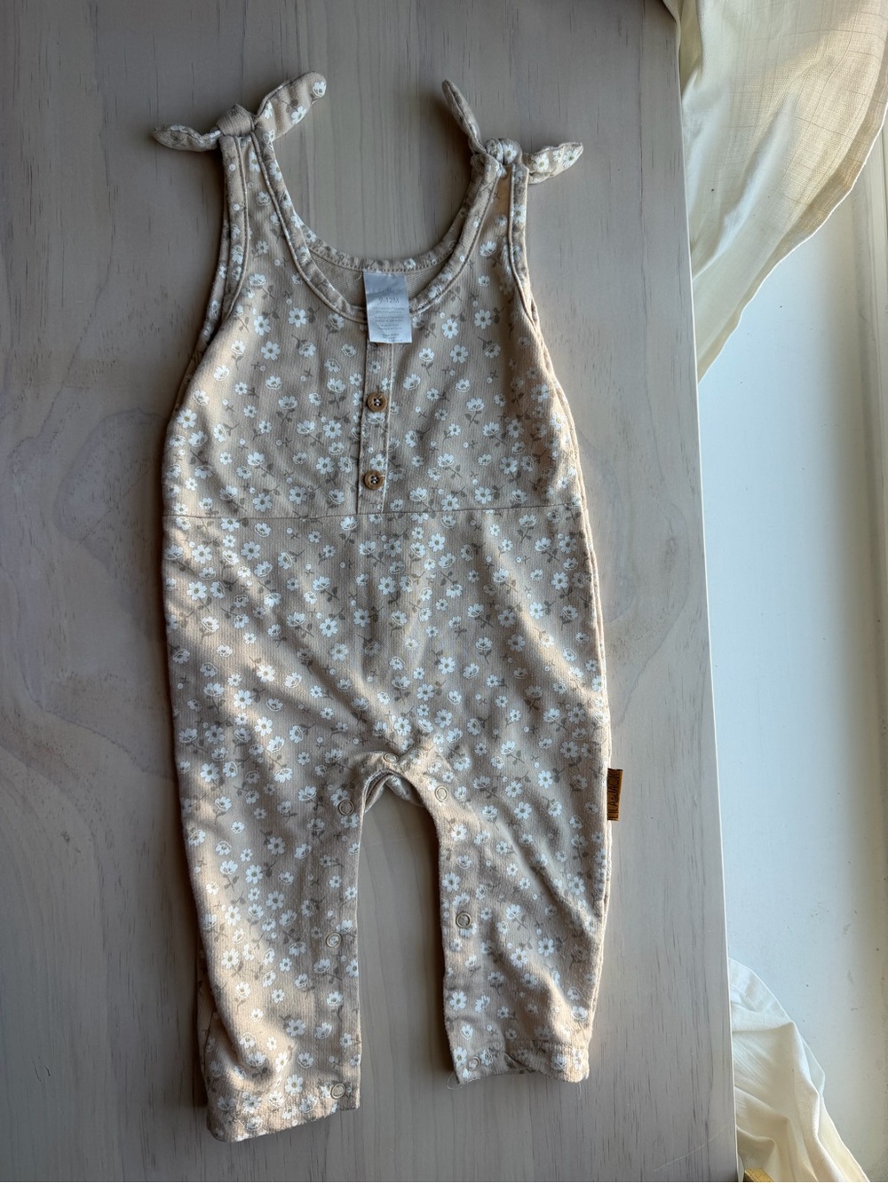 Lila & Jack Beige Floral Tie-Shoulder Baby Romper